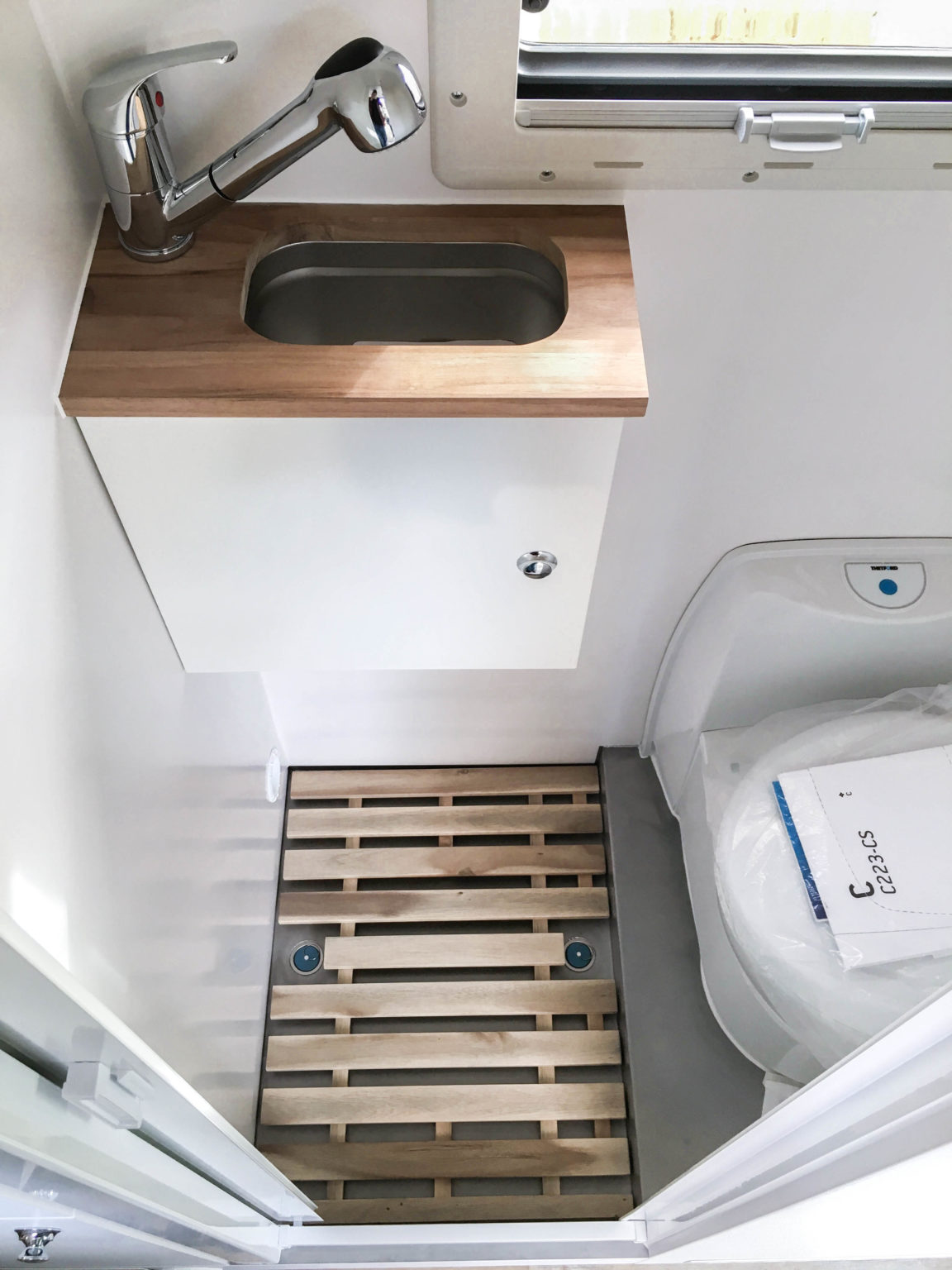Wetroom with shower and toilet in our Camper Van Overlandys