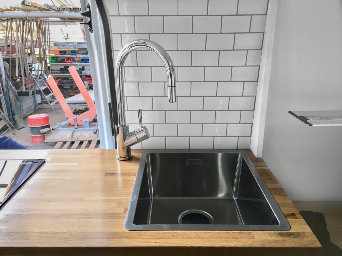 Sink and faucet in Camper kitchen